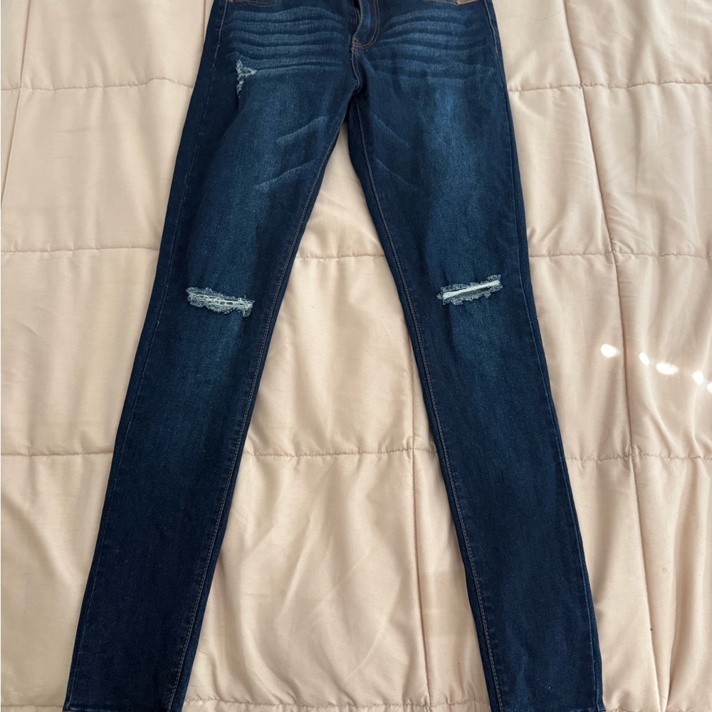 Women's Distressed Blue Jeans